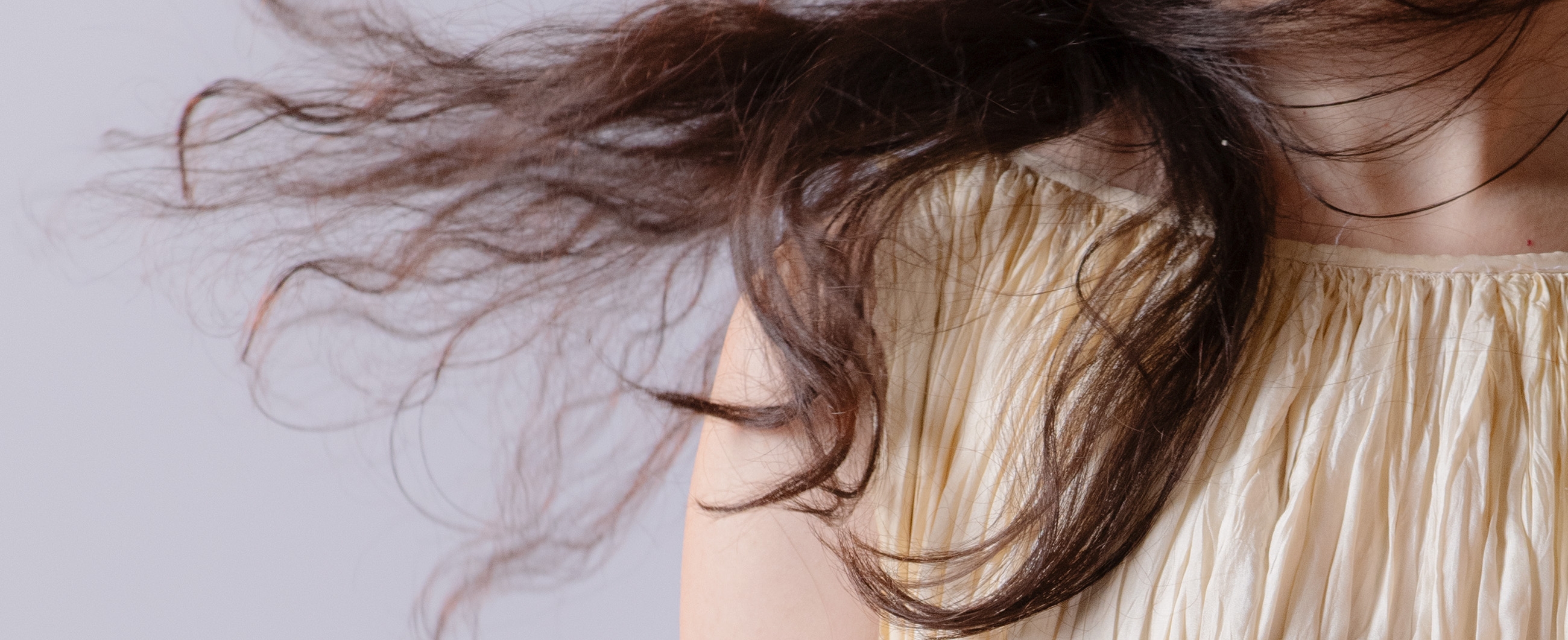 Haare wehen im Wind